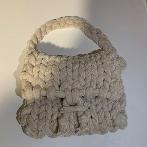 A crochet velvet bag.
